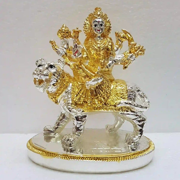 Gold and silver plated Ambe Mata idol on lion, a traditional Navratri gift