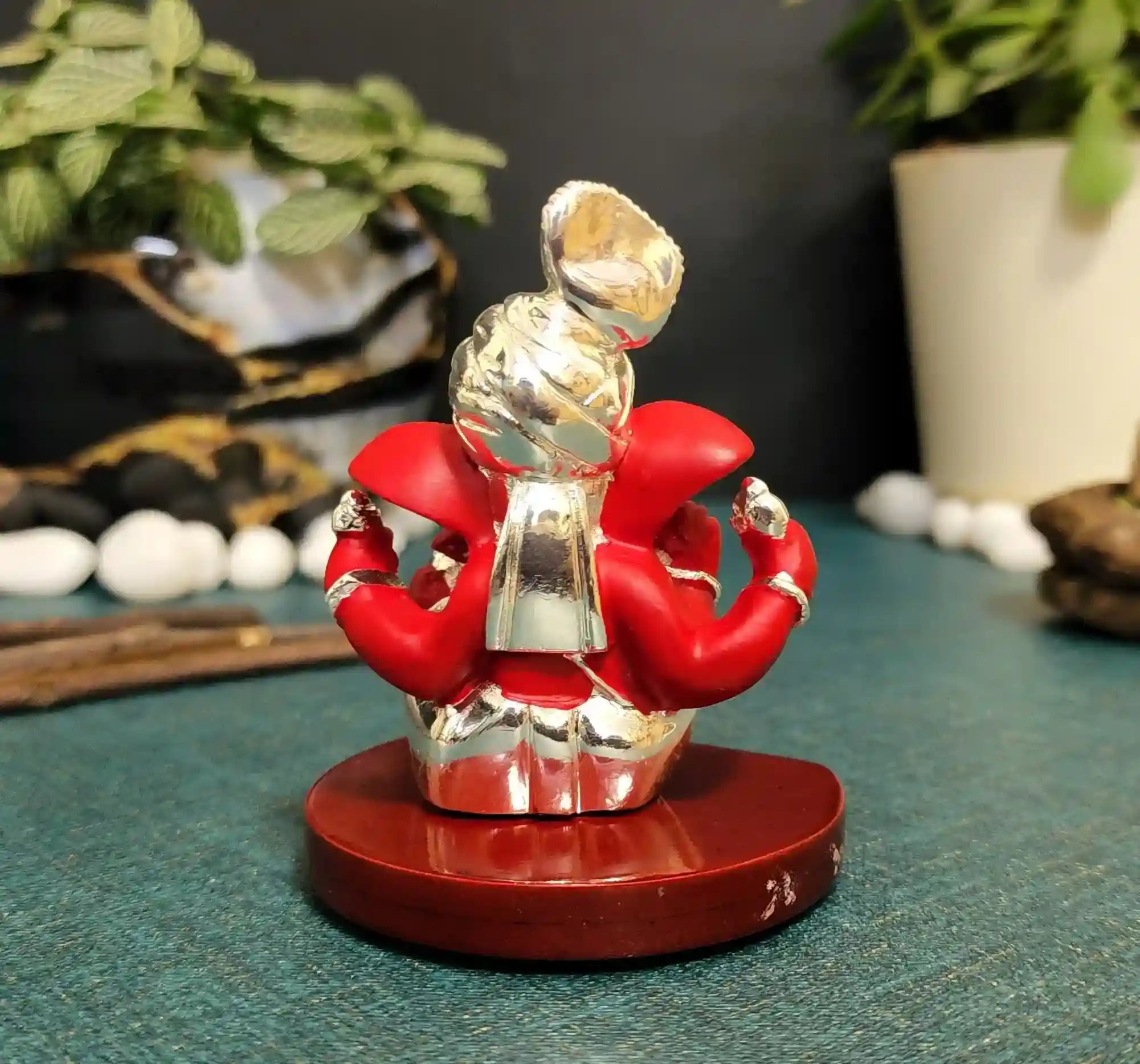 Back view of Red Terracotta Pagadi Ganesh Idol – 3 inch tall, sturdy MDF base with double-sided tape for easy placement.
