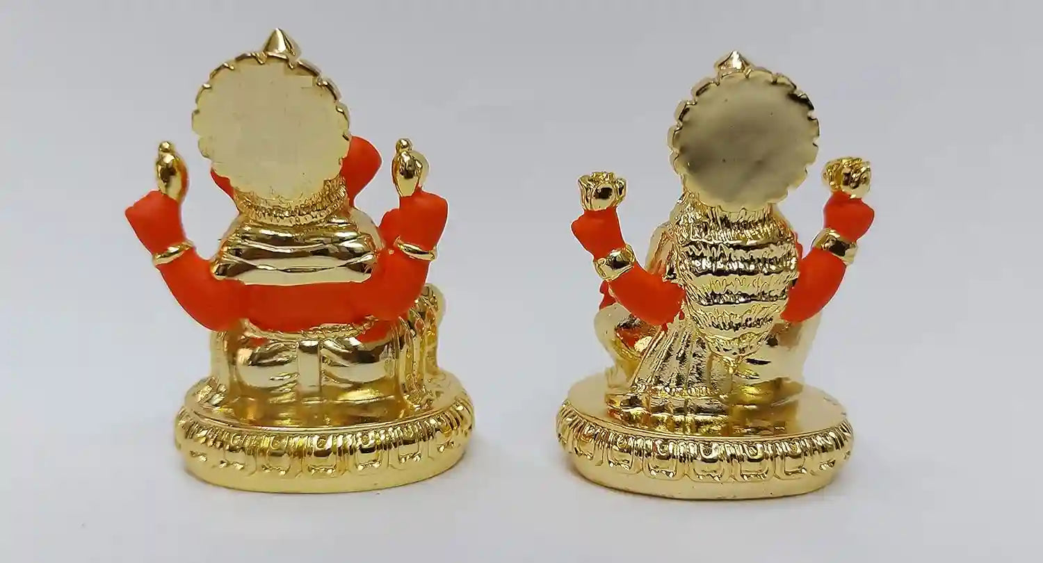 Back view of Lakshmi and Ganesha resin idols, gold plated with gold-orange detailing, showcasing intricate handcrafted finish