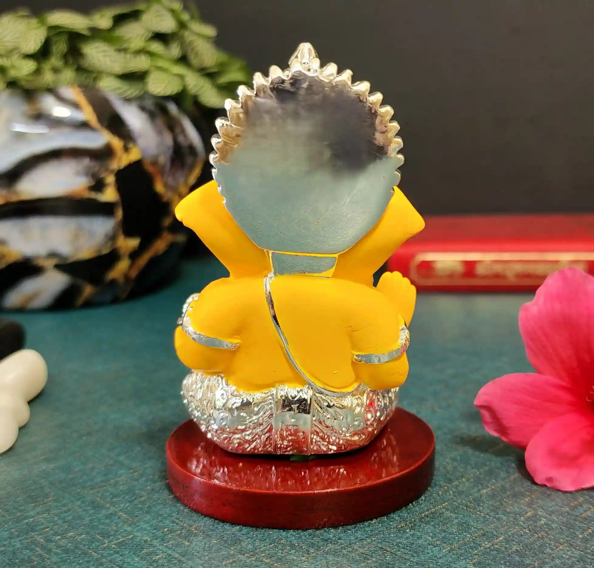 Back view of Silver Plated Yellow Ganesha Idol showing craftsmanship and smooth finish.