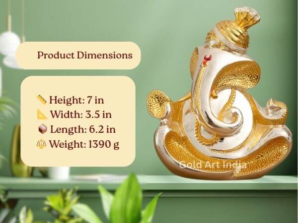 Front view of a gold and silver Ganesha idol with product dimensions listed: Height 7 in, Width 3.5 in, Length 6.2 in, Weight 1390g.