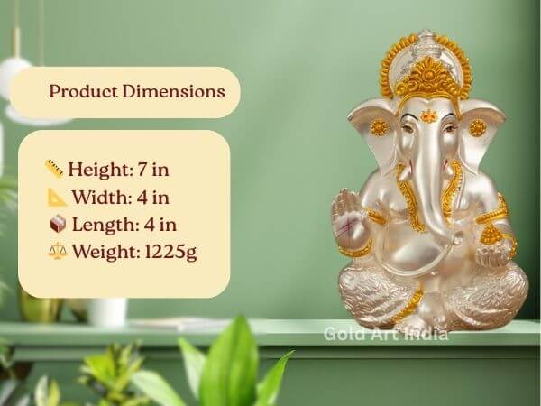 Front view of a gold and silver Ganesha idol with product dimensions listed: Height 7 in, Width 4 in, Length 4 in, Weight 1225g.