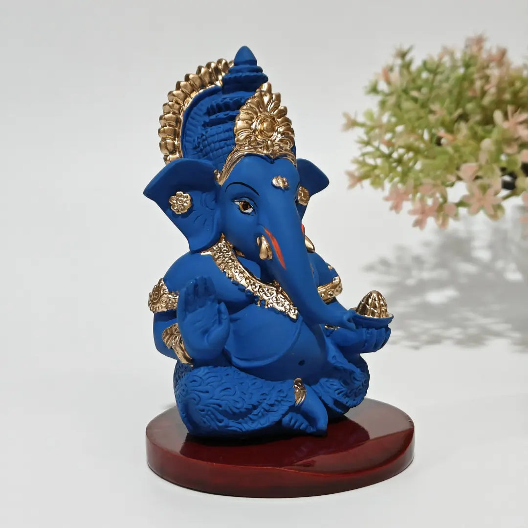 Blue terracotta Mukut Ganesh idol with MDF Base intricated detailing left side view