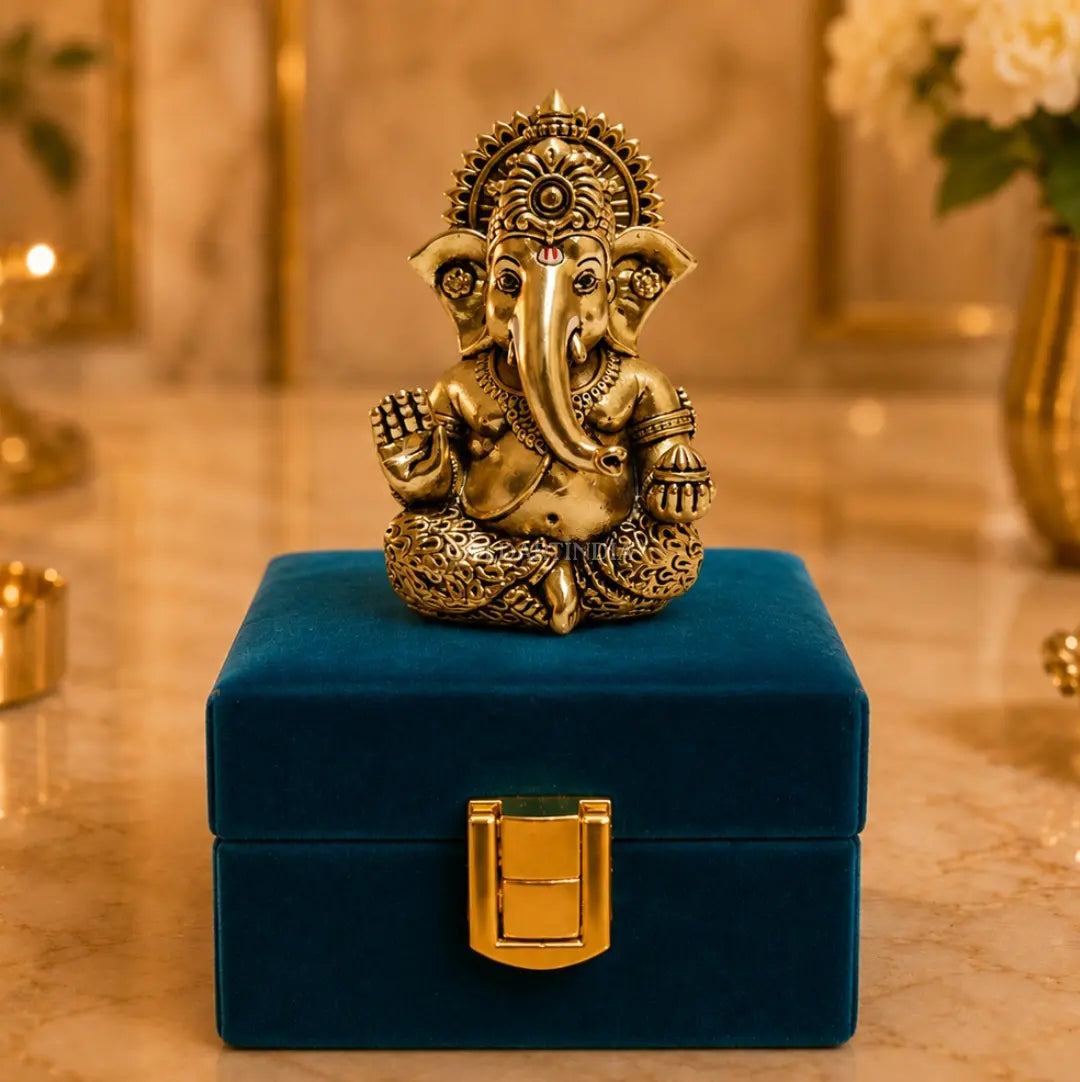Gold Art India Ganesh Idol โ angled view showing gold antique matte detailing