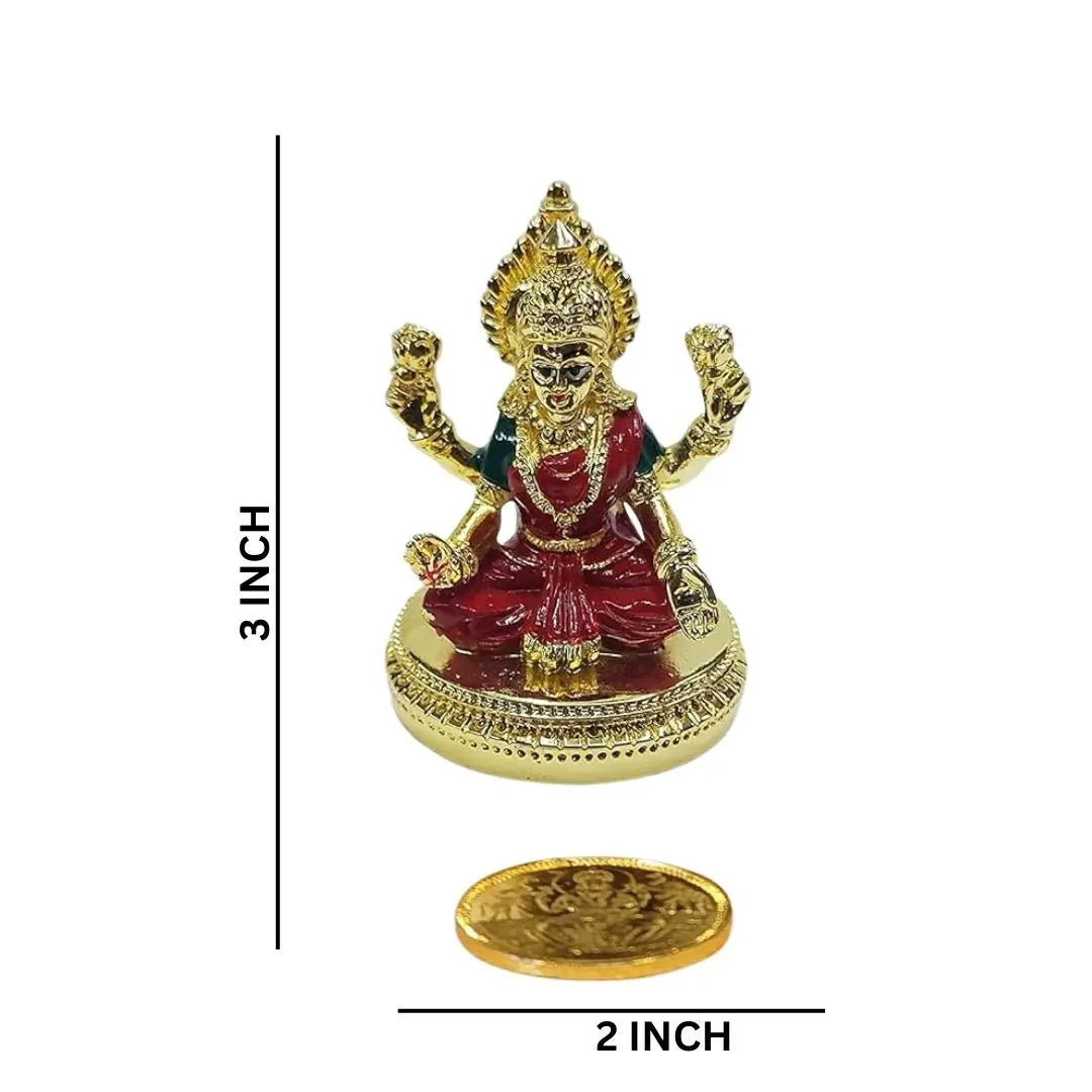 Compact 3-inch Lakshmi idol with red enamel work, placed on round base, shown with gold-plated coin for size reference.