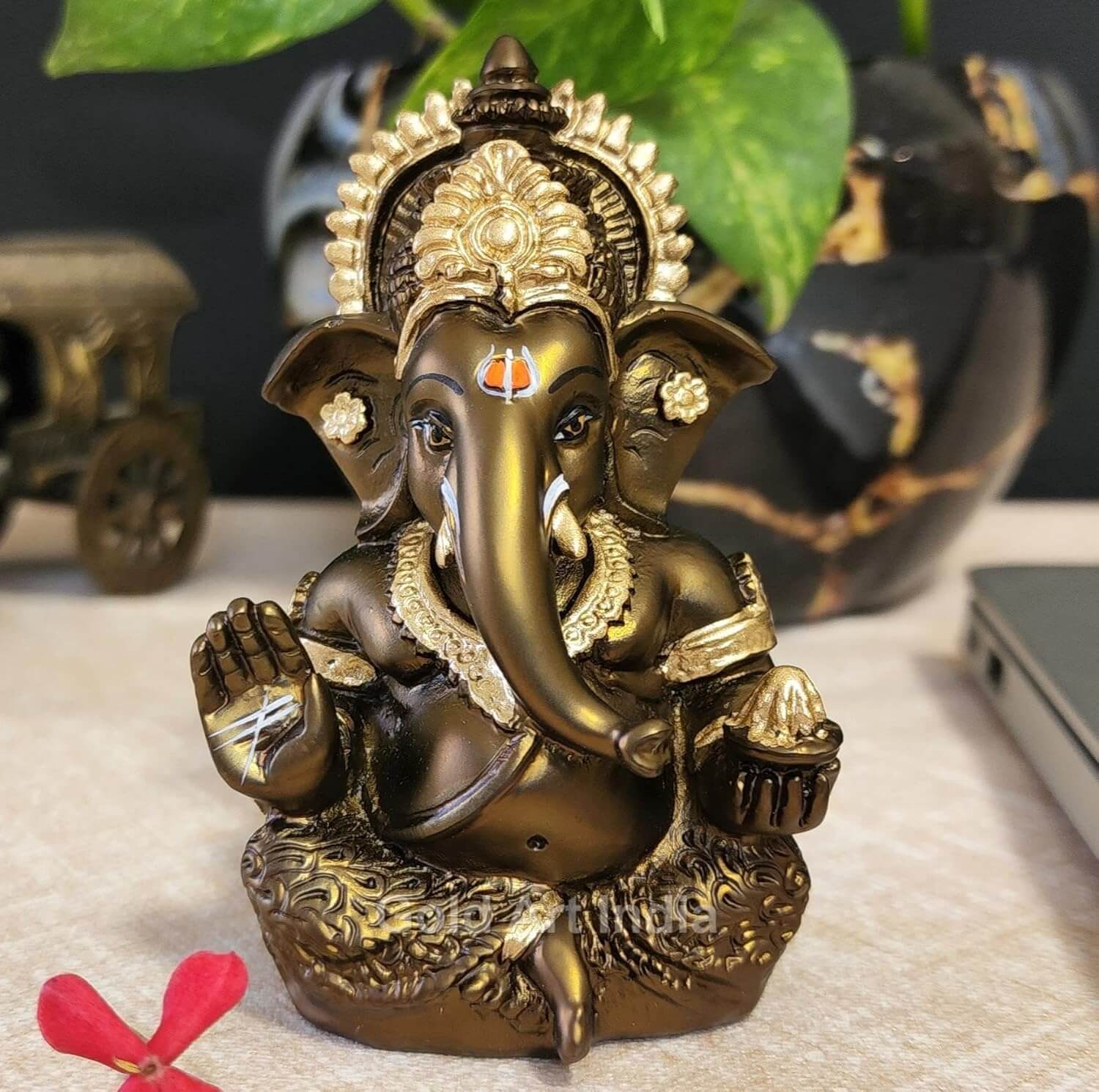 Lord Ganesha idol in french brown finish, perfect for home and office decor, adding spiritual elegance.