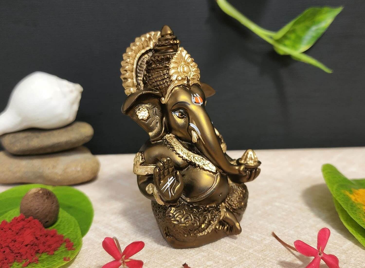 Lord Ganesha idol in french brown finish, perfect for home and office decor, showcasing intricate design and divine charm.