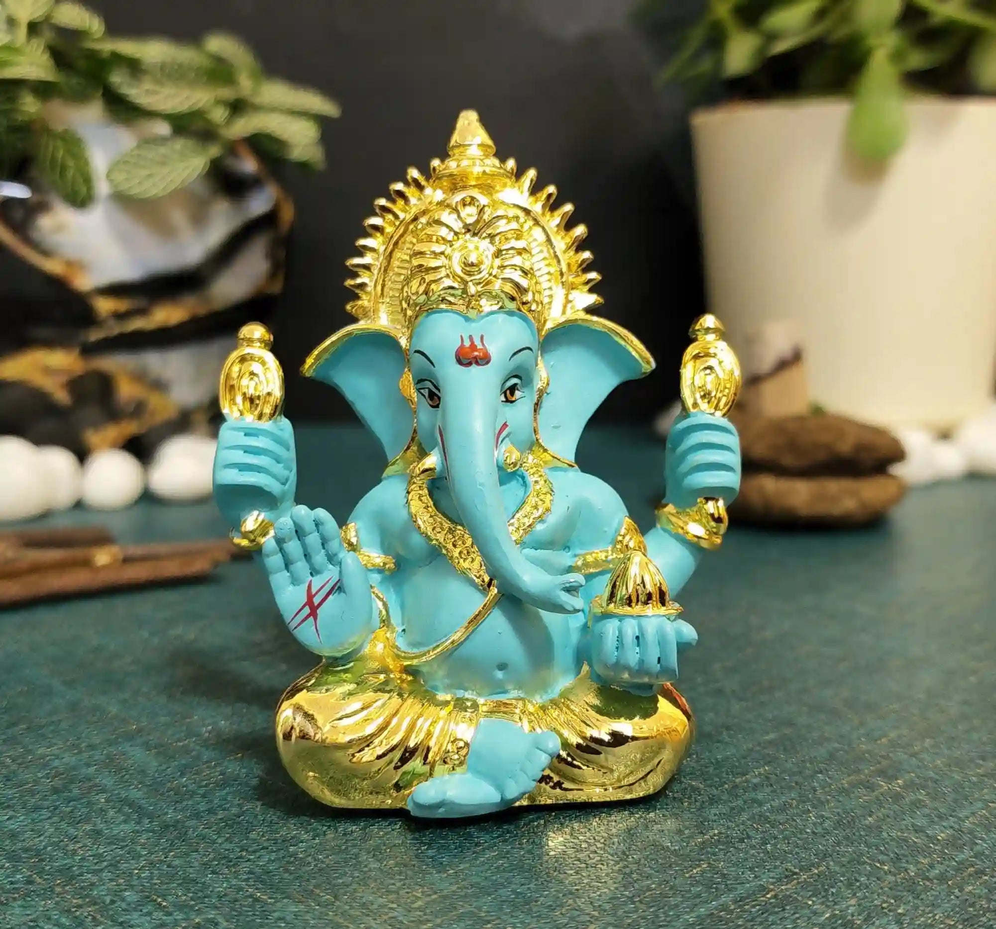 Front view of FluroGreen Ganpati Idol with golden detailing – compact 3.5 inch decorative statue for home mandir, office desk, and décor.