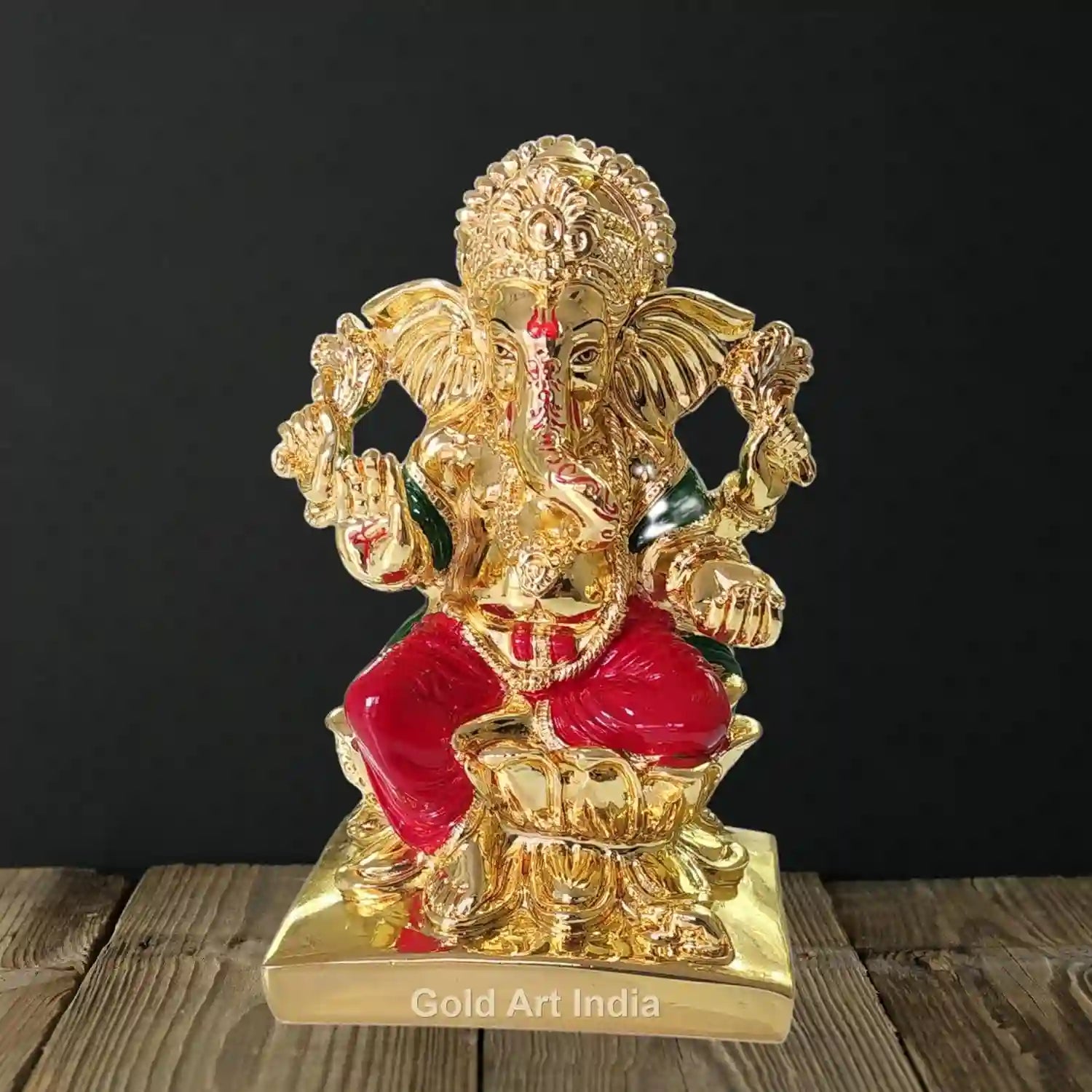 7-Inch Ganesha Idol in gold plating with red enamel finish, premium craftsmanship
