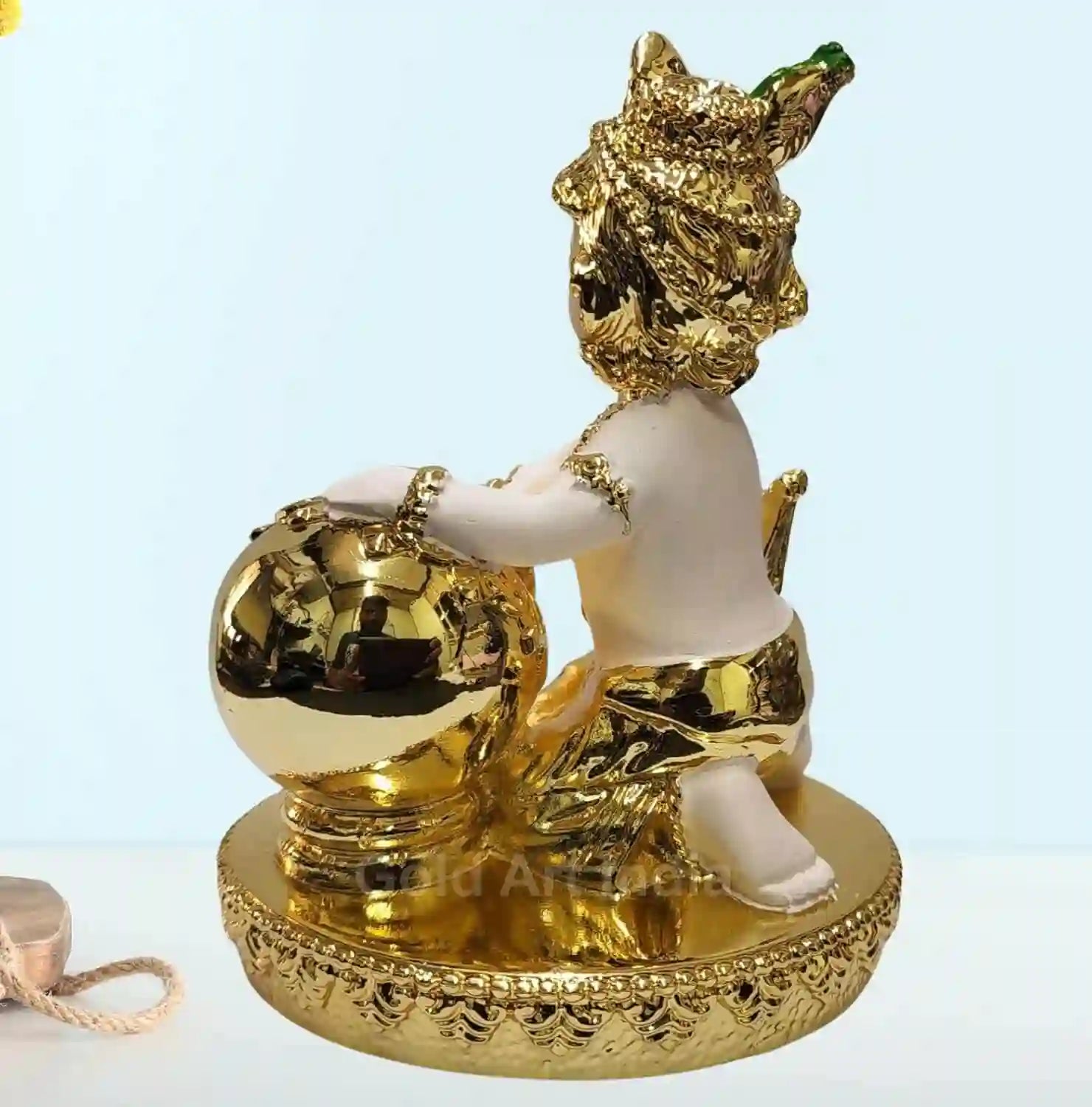 Goldplated_Off__White_Makhan_Krishna_idolsitting with a butter pot