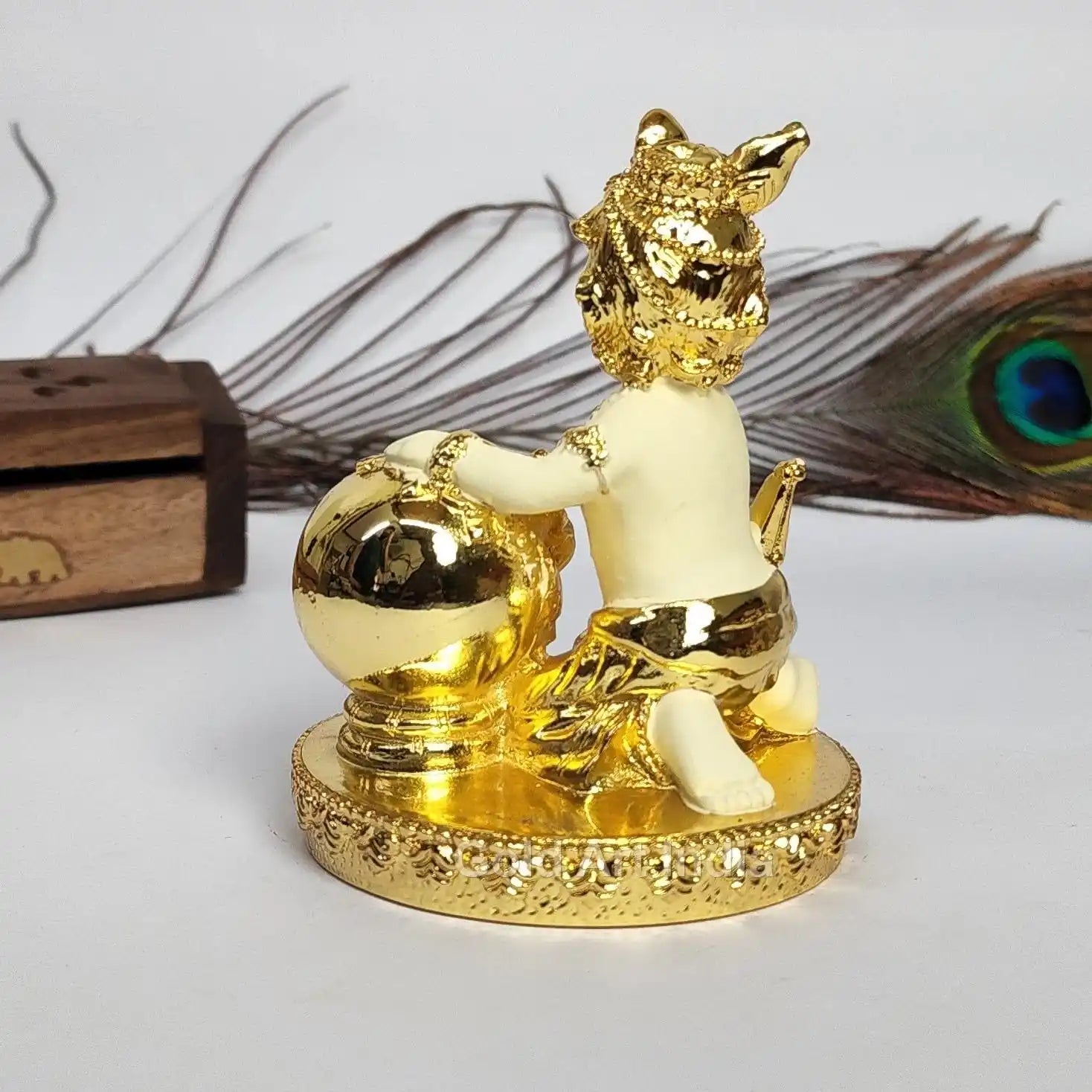 Goldplated_Off__White_Makhan_Krishna_idolsitting with a butter pot