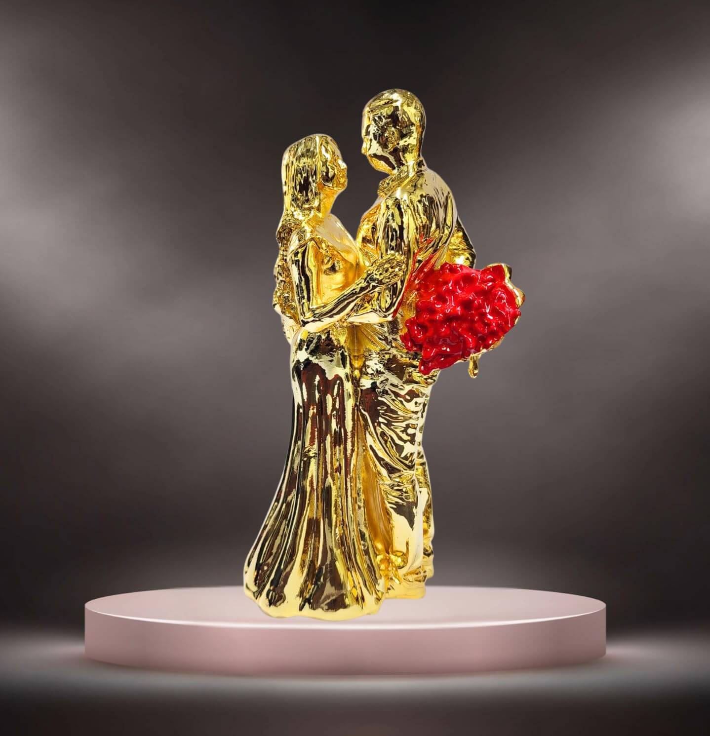 Gold-plated romantic couple figurine holding a bouquet.