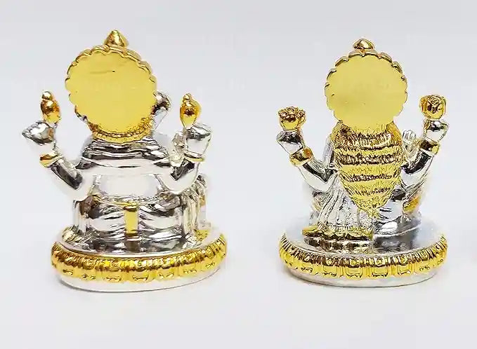 Back view of Lakshmi and Ganesha resin idols with gold & silver plated detailing, highlighting fine craftsmanship on pedestal and attire.