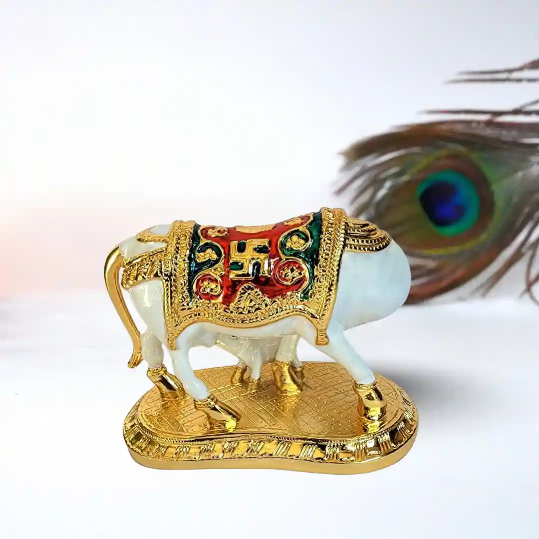 Handcrafted Kamdhenu Cow Statue with intricate detailing and gold accents