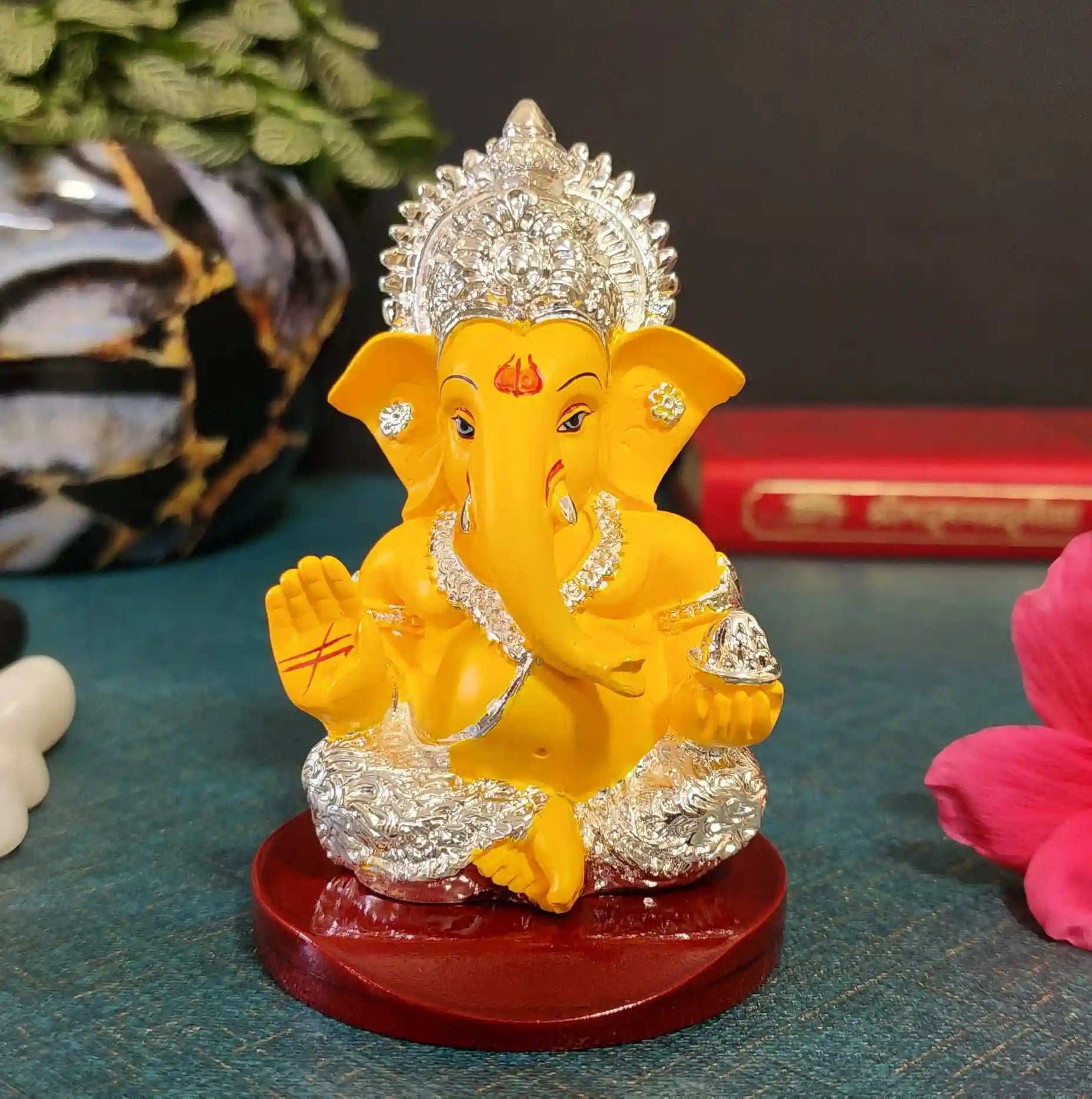 Handcrafted Silver Plated Yellow Ganesha Idol with intricate detailing and glossy finish.