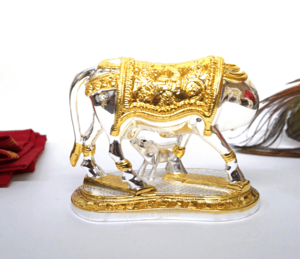 Kamdhenu Cow Idol on Display with Decorative Background