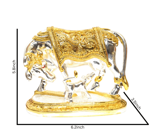 Gold Art India Kamadhenu cow and calf idol with gold and silver Plated detailing, featuring traditional carvings and spiritual symbols. Dimensions: 6.2 inches (L) x 5.8 inches (H) x 3.5 inches (W). Ideal for home decor, puja rituals, and gifting