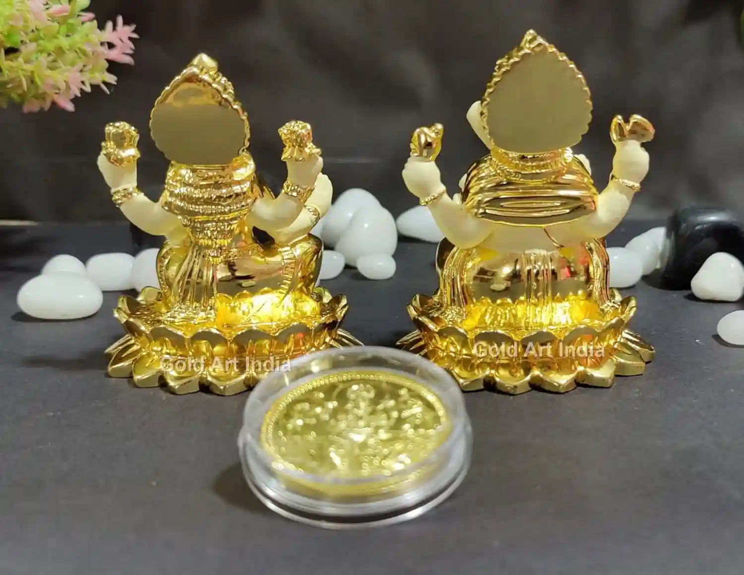Back view of Gold Plated Lakshmi and Ganesh idols with detailed craftsmanship on terracotta base