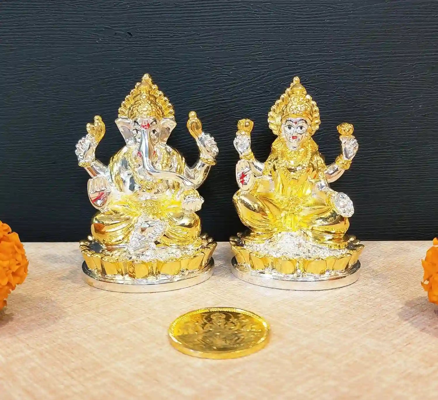 Two-Tone Lakshmi & Ganesha Idols with Gold-Plated Coin, handcrafted resin artistry