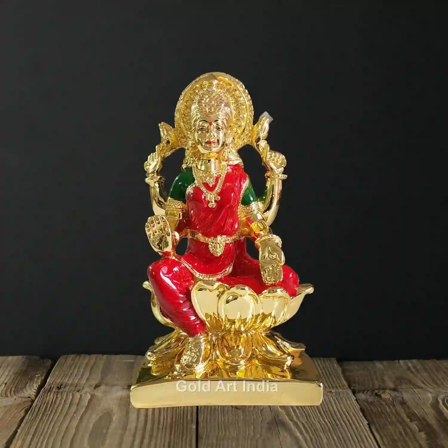 Gold Plated 7-Inch Lakshmi Idol with red enamel attire, handcrafted detailing
