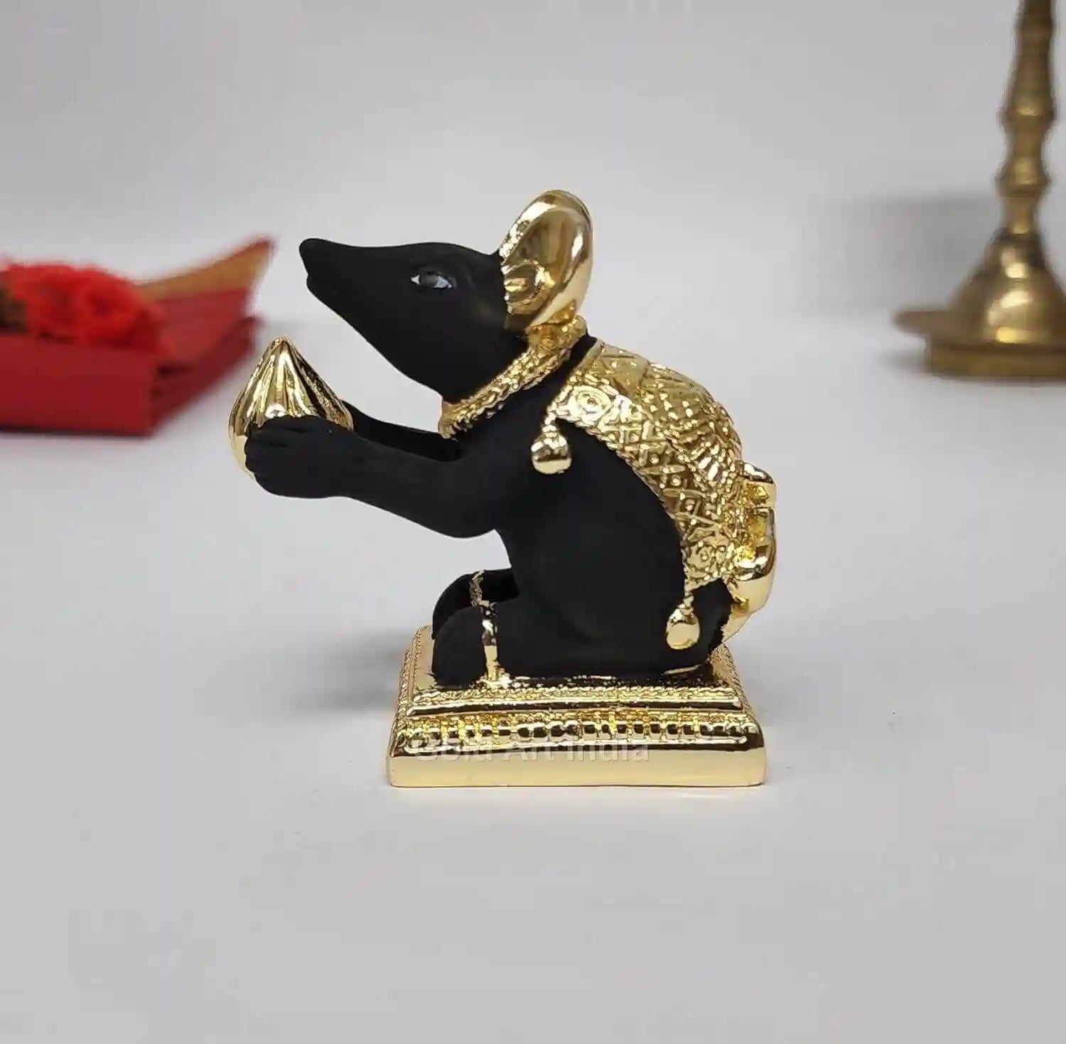 Black terracotta gold-plated Mushak idol with modak – Ganesha vahana