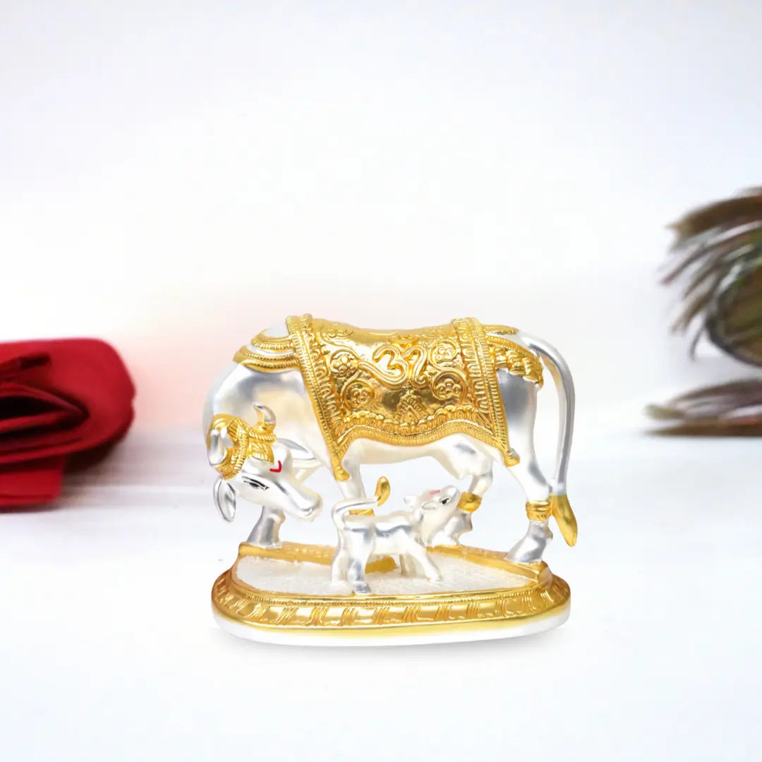 Gold and silver plated Kamdhenu cow with calf idol in matte finish โ front view