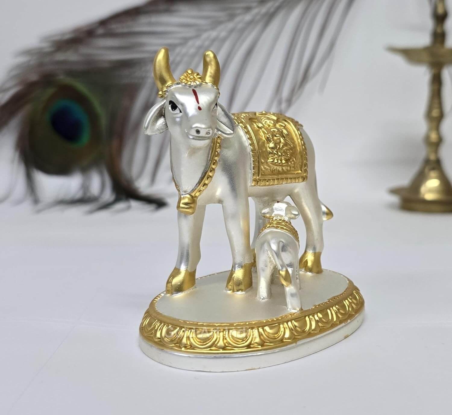 Kamdhenu idol placed on wooden shelf – perfect for Vastu, puja rooms, or home decor