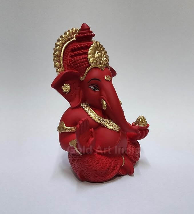 Handcrafted Maroon Red Terracotta Lord Ganesha Idol with golden detailing for home, office, or car decor.