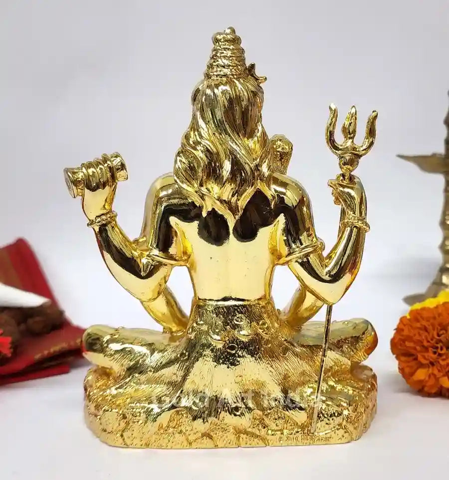 Back view of Lord Shiva idol highlighting handcrafted details and gold plated finish