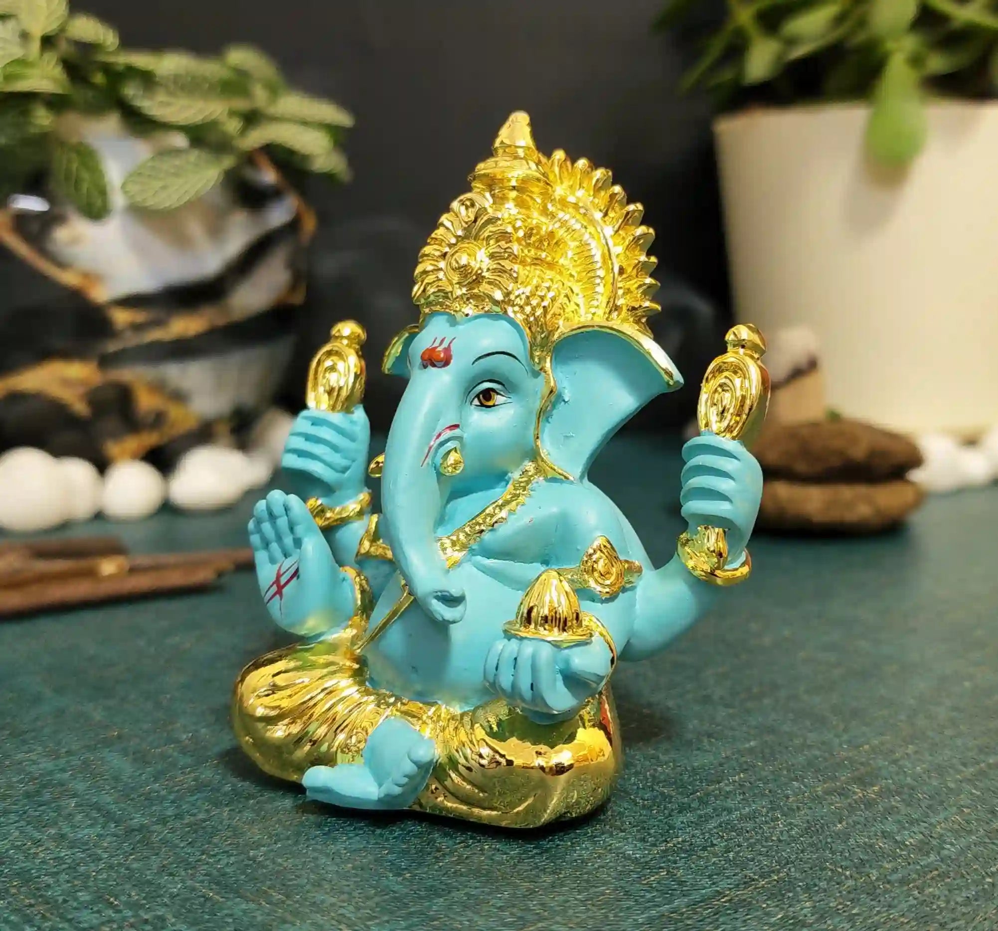 Side view of FluroGreen Ganesh Idol on golden base – perfect for car dashboards, home temples, and festival gifting.