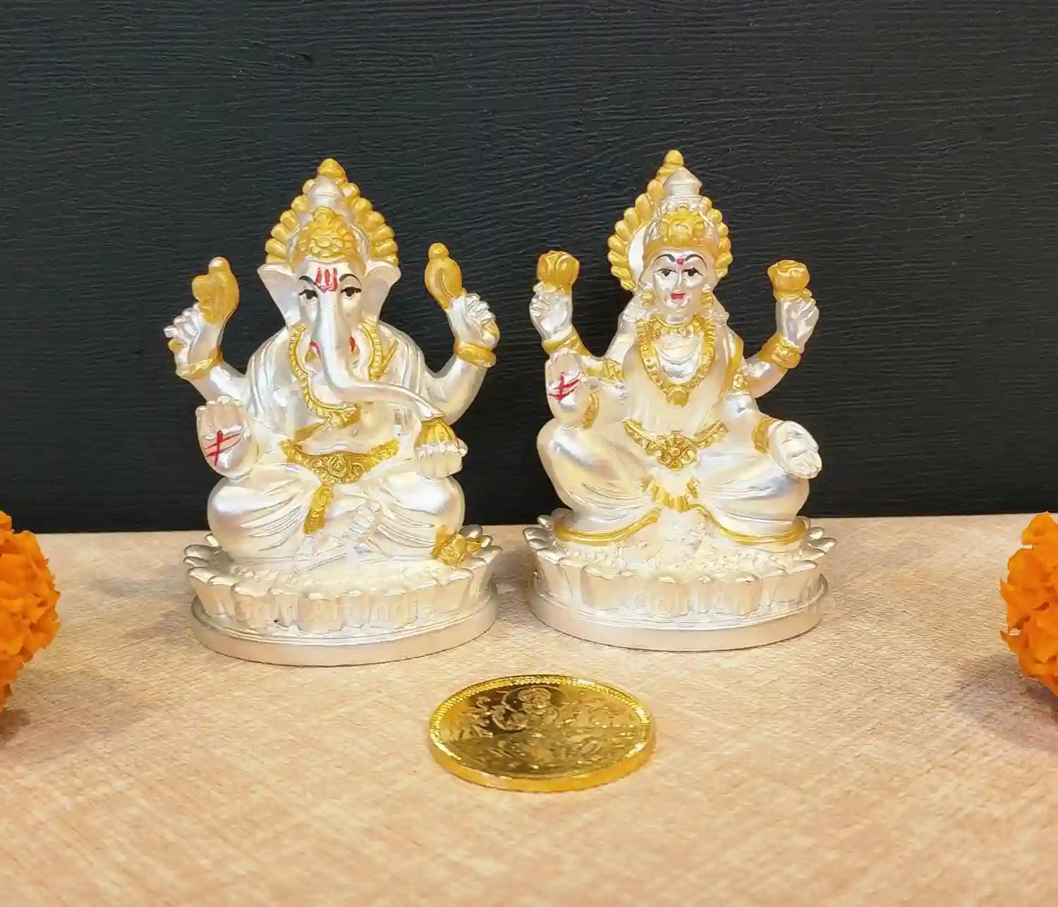 Silver-Plated Lakshmi and Ganesha Idol Set with gold-plated coin, handcrafted with matte finish for puja and décor