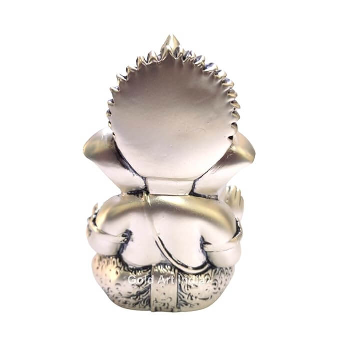 Silver Antique matte Ganesha idol with detailing, seated in a blessing posture, holding a modak in one hand. back