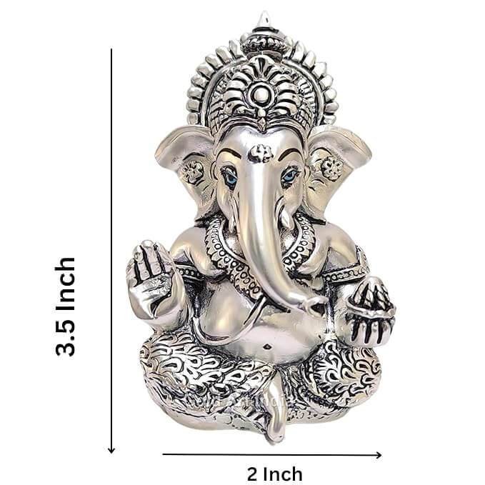 Silver Antique matte Ganesha idol with detailing, seated in a blessing posture, holding a modak in one hand. dimension 3.5x2x inches