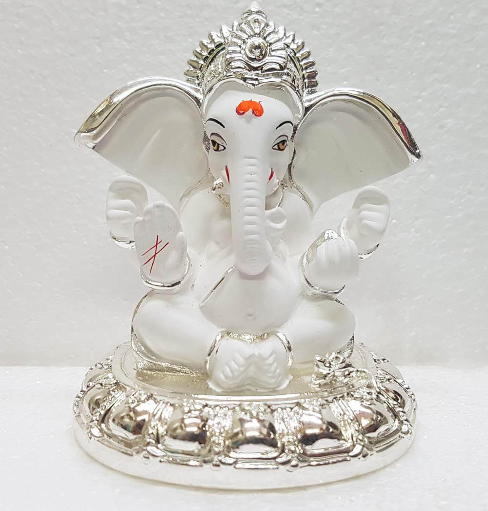 Beautifully crafted Silver Plated Big Ear Ganesha Idol with a white terracotta finish front