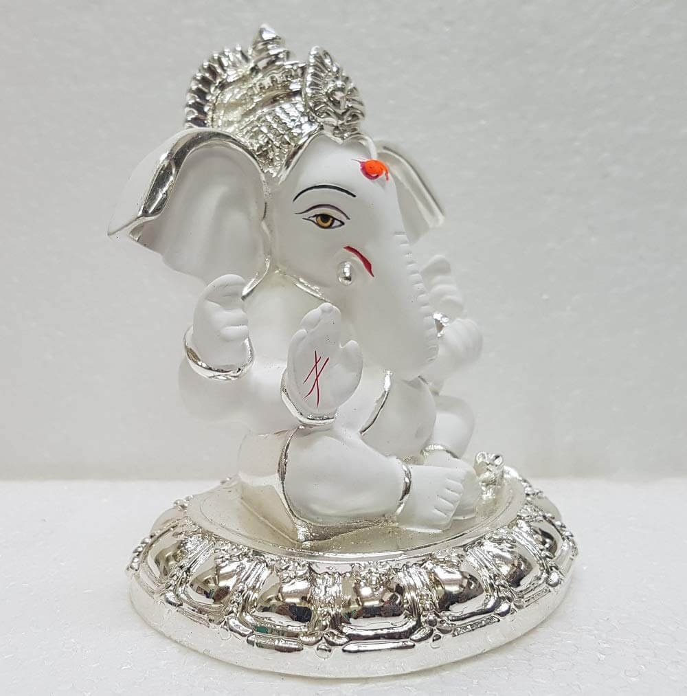 Beautifully crafted Silver Plated Big Ear Ganesha Idol with a white terracotta finish side view