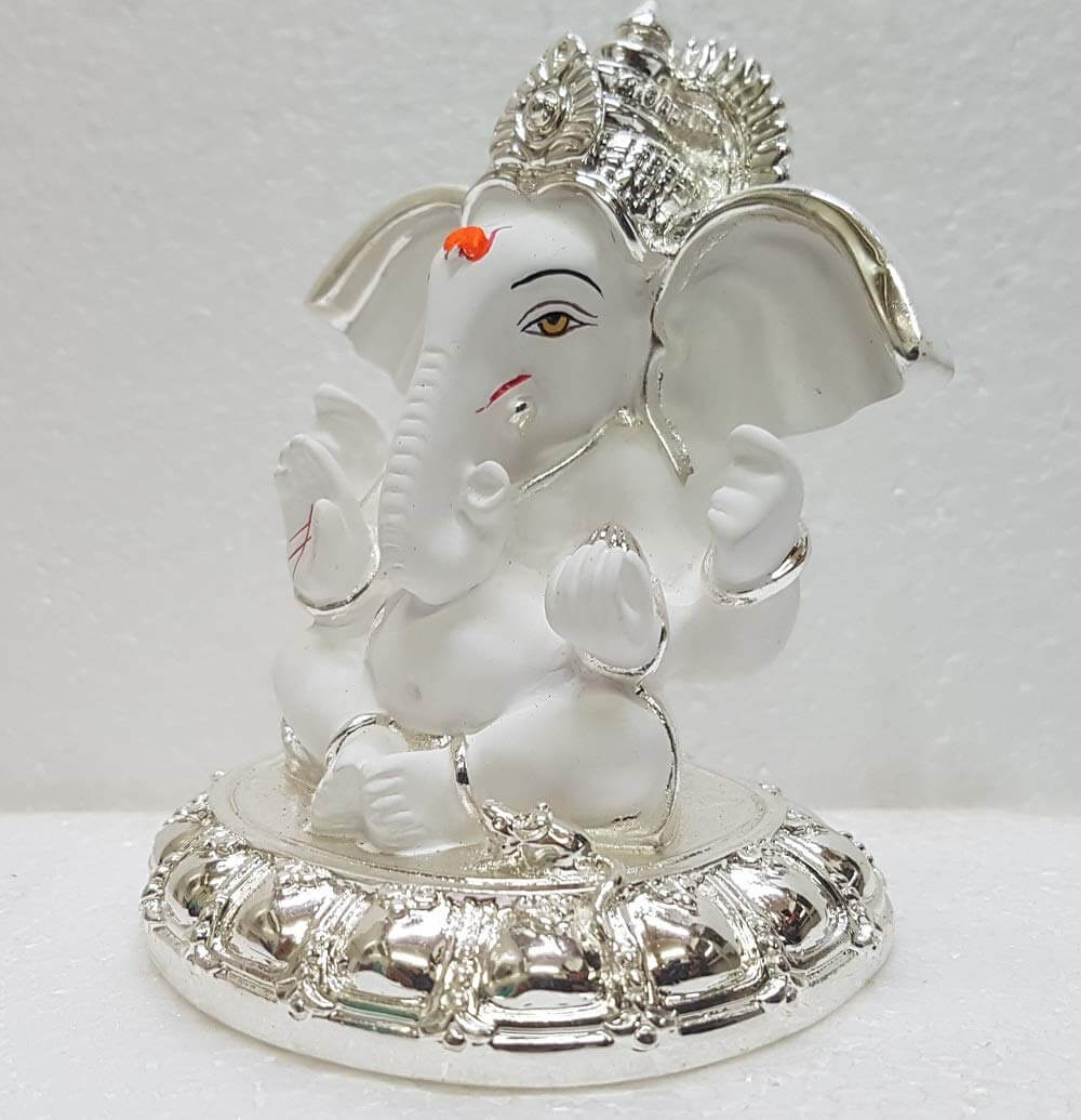 Beautifully crafted Silver Plated Big Ear Ganesha Idol with a white terracotta finish side view