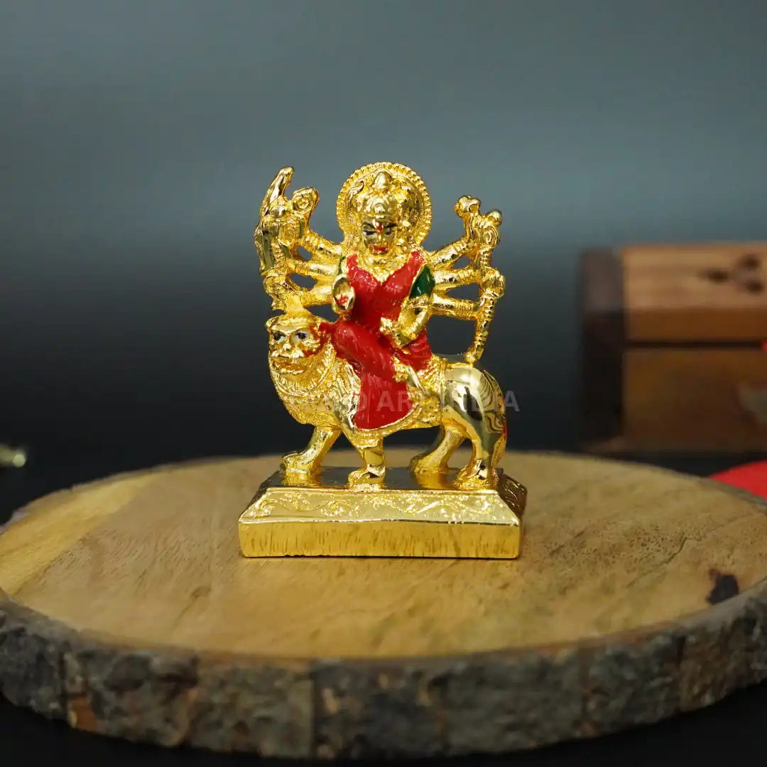 Front view of 2.7-inch Small Ambe Maa Idol riding lion, electroplated gold with multicolour attire – handcrafted Hindu deity statue