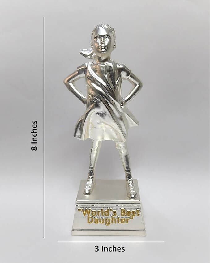 A silver-plated trophy of a confident young girl standing with her hands on her hips. The figure is fully silver, with a flowing dress and ponytail. The trophy stands on a rectangular silver base with the engraved text "World's Best Daughter". The dimensions of the trophy are marked as 8 inches in height and 3 inches in width.