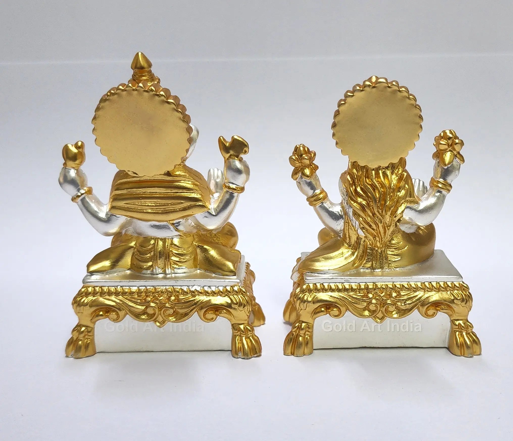 Back view of gold and silver plated Laxmi Ganesha idols seated on decorative peeth base by Gold Art India, matte finish