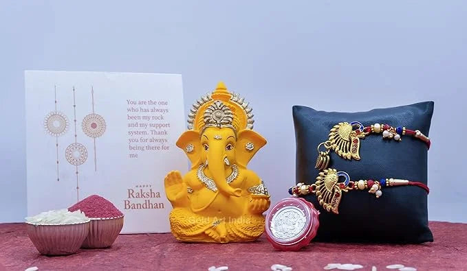 Rakhi gift combo with mango Ganesha idol, card, rakhi, lumba and coin – Gold Art India