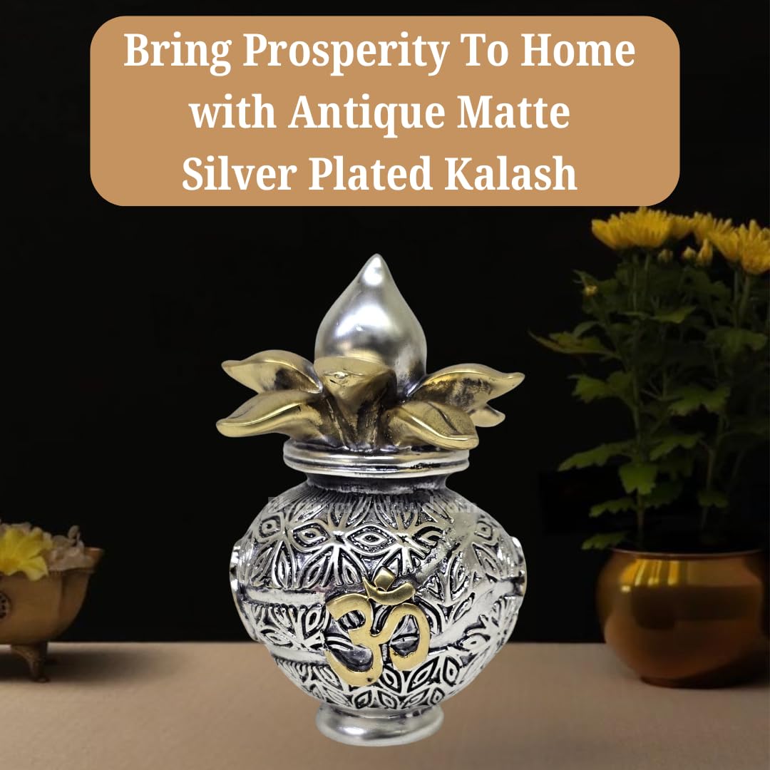 Close-up antique silver plated kalash with embossed patterns and gold Om symbol