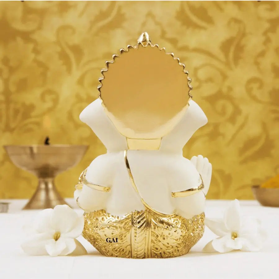 Gold plated off white ganesha idol back view
