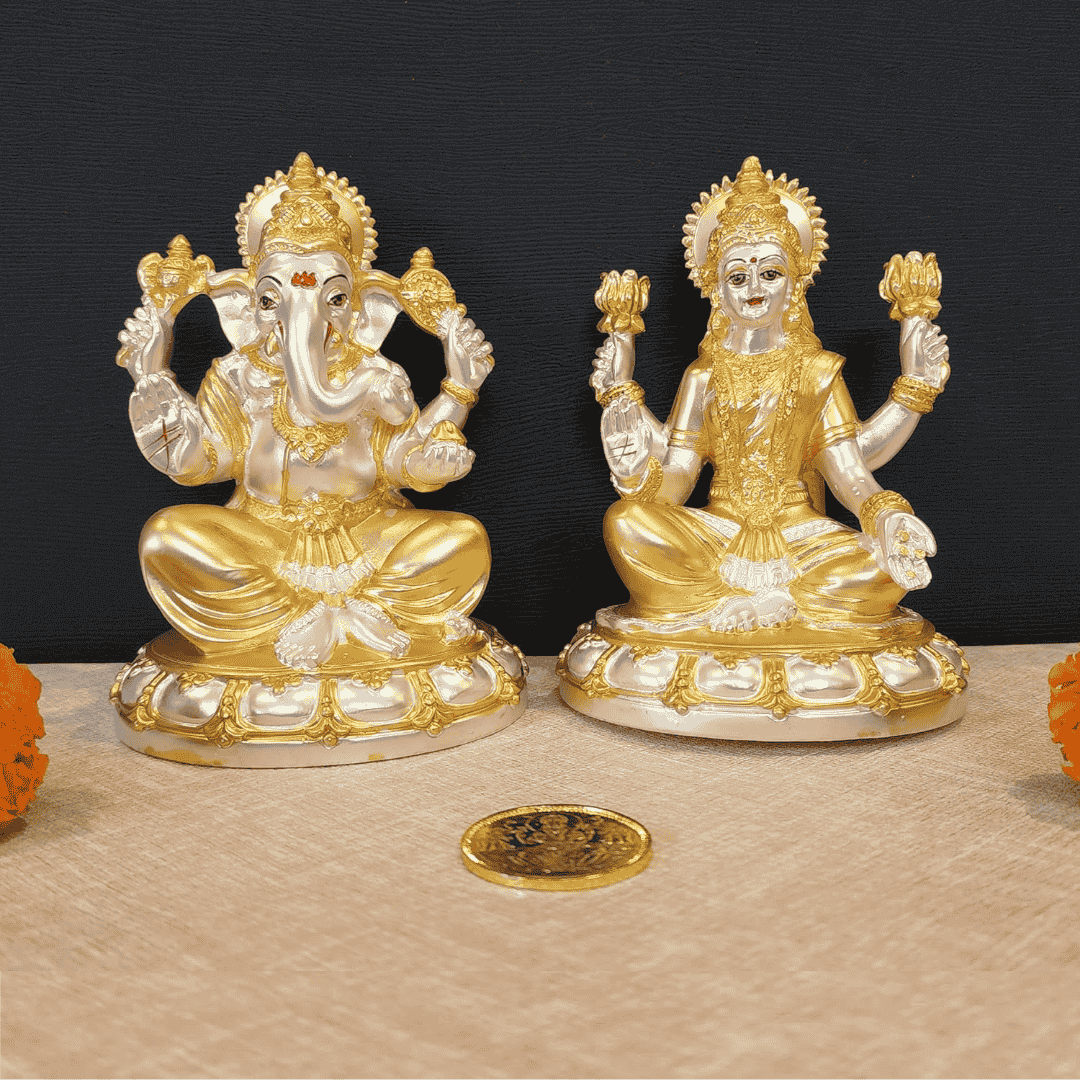 Gold plated Laxmi and Ganesha idol set on a round base, perfect for Diwali Puja and home decor.