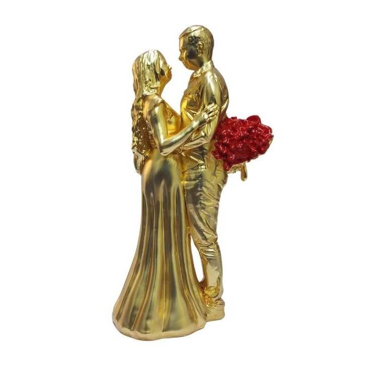 Gold-plated romantic couple figurine with a matte finish, holding a bouquet