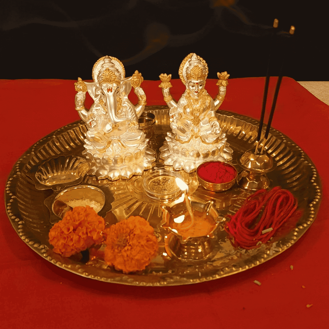 Kamal Laxmi Ganesh silver matte idol on a decorative thali with candles, flowers, and incense, perfect for home decor.