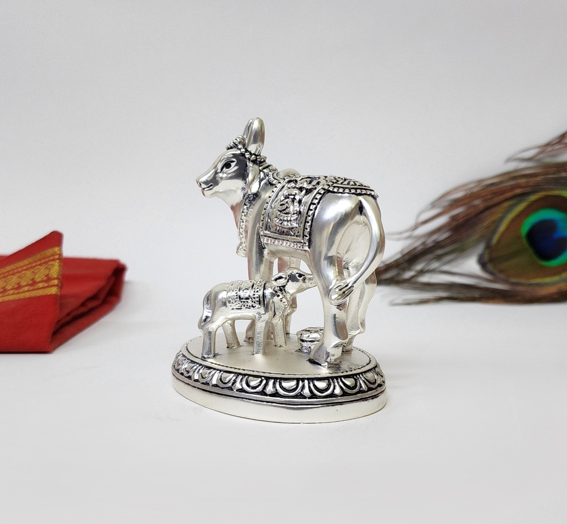 Side view of Kamdhenu Cow and Calf on round base