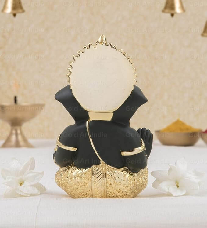 Back view of Lord Ganesha gold plated idol with terracotta finish, perfect for home or office decor.