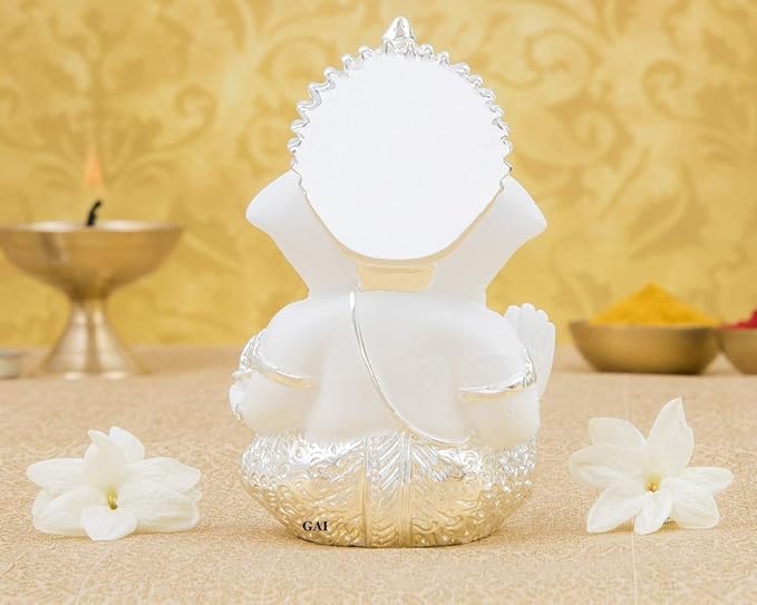 Silver plated Lord Ganesha idol with terracotta finish, perfect for home and office decor, featuring exquisite craftsmanship.