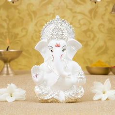 Silver plated Ganesha idol with terracotta finish, ideal for home and office decor, perfect gift for any occasion.