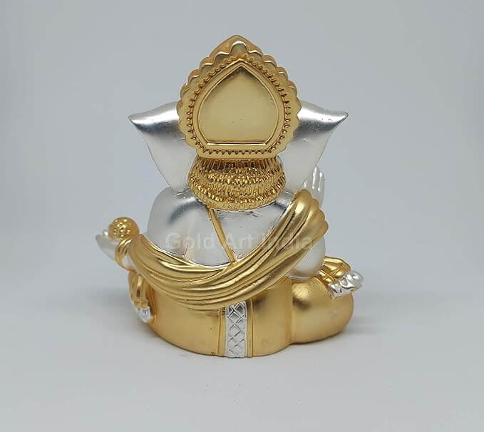 Back view of a two-tone matte finish Ganesha idol with gold and silver accents, perfect for home or car decor.